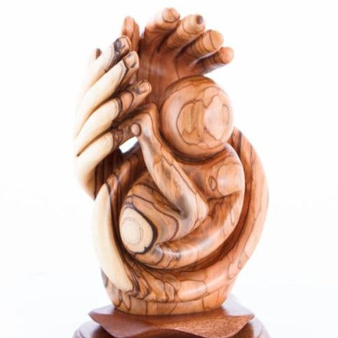 Agape Carving of Baby Protected by Hand of God, Abstract Mercy of God in Olive Wood, Beautiful Realistic Hands