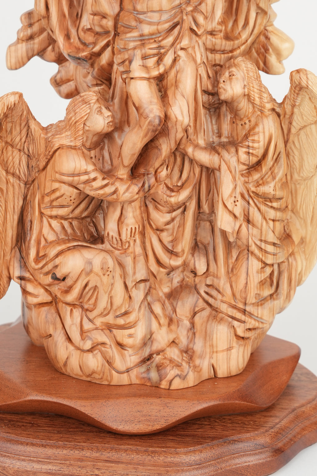 Jesus Christ statue hand carved from Bethlehem olive wood, three quarter view of the religious piece