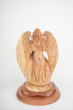 Holy Family olive wood statue hand carved in Bethlehem, 11.8 inch three quarter view of the religious piece