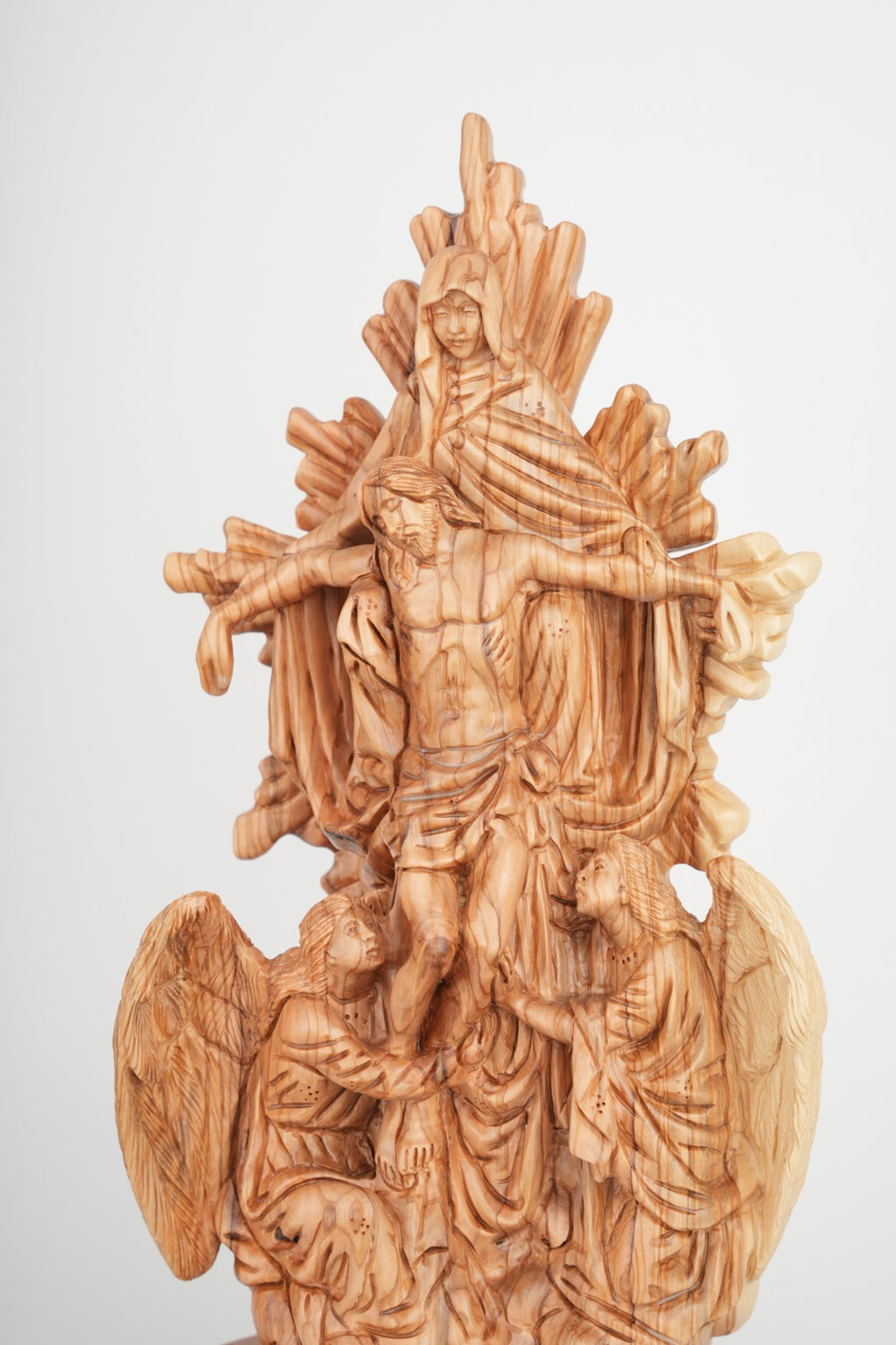 Jesus Christ statue hand carved from Bethlehem olive wood, close detail of the hand carved work