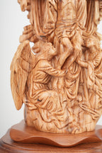 Jesus Christ statue hand carved from Bethlehem olive wood, back view of the olive wood sculpture