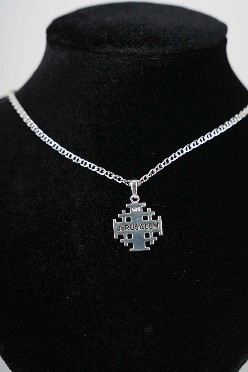 Religious jewelry hand made in Bethlehem Holy Land, side angle of the sterling silver sculpture