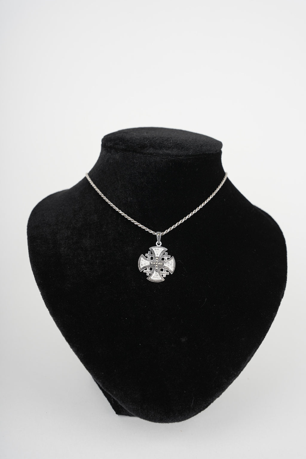Religious jewelry hand made in Bethlehem Holy Land, side angle of the sterling silver sculpture