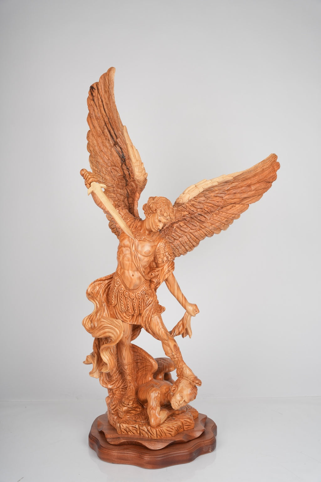 Angel olive wood statue hand carved in Bethlehem, front view of the olive wood masterpiece