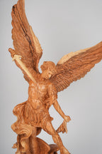 Angel olive wood statue hand carved in Bethlehem, three quarter view of the religious piece