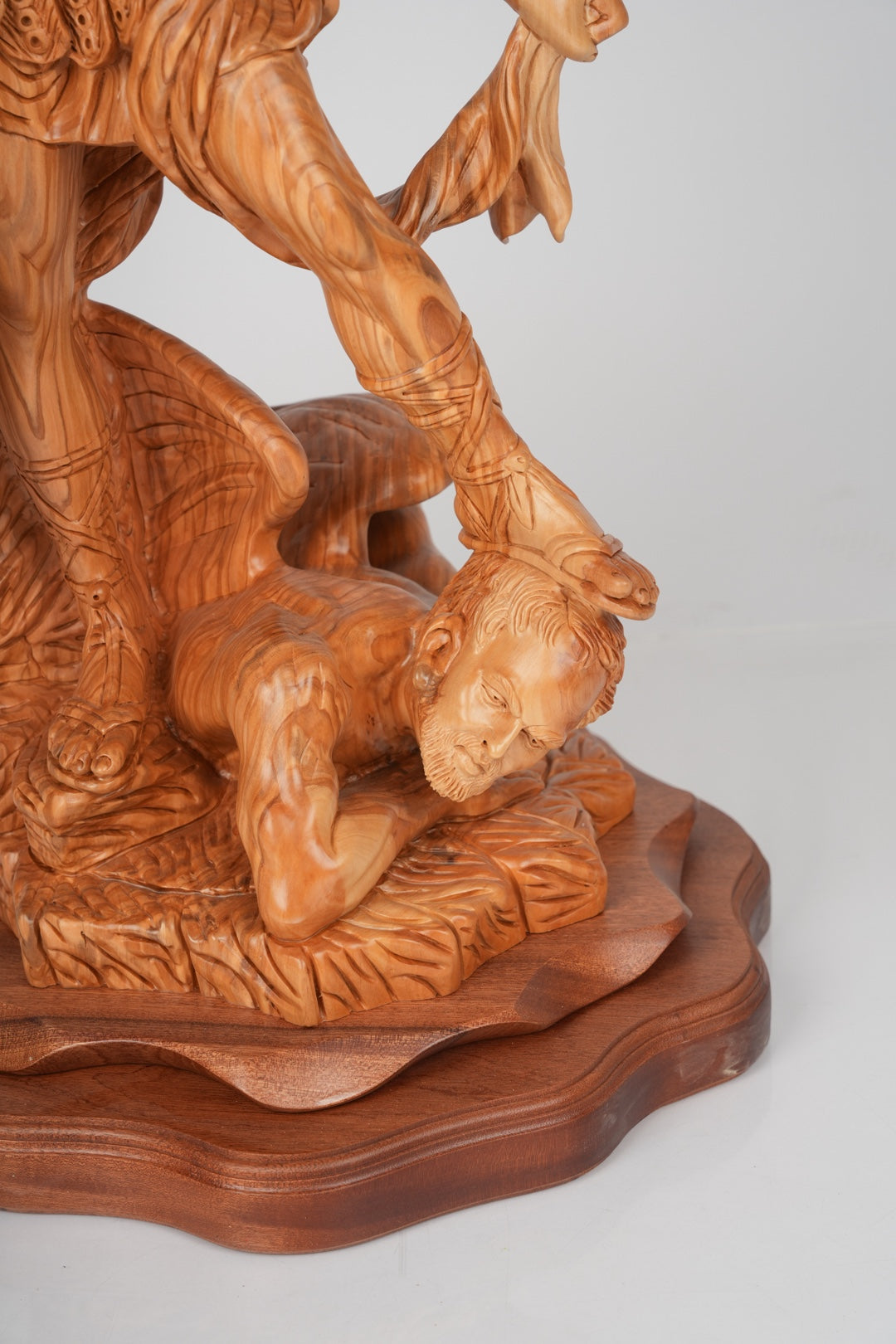Angel olive wood statue hand carved in Bethlehem, back view of the olive wood sculpture