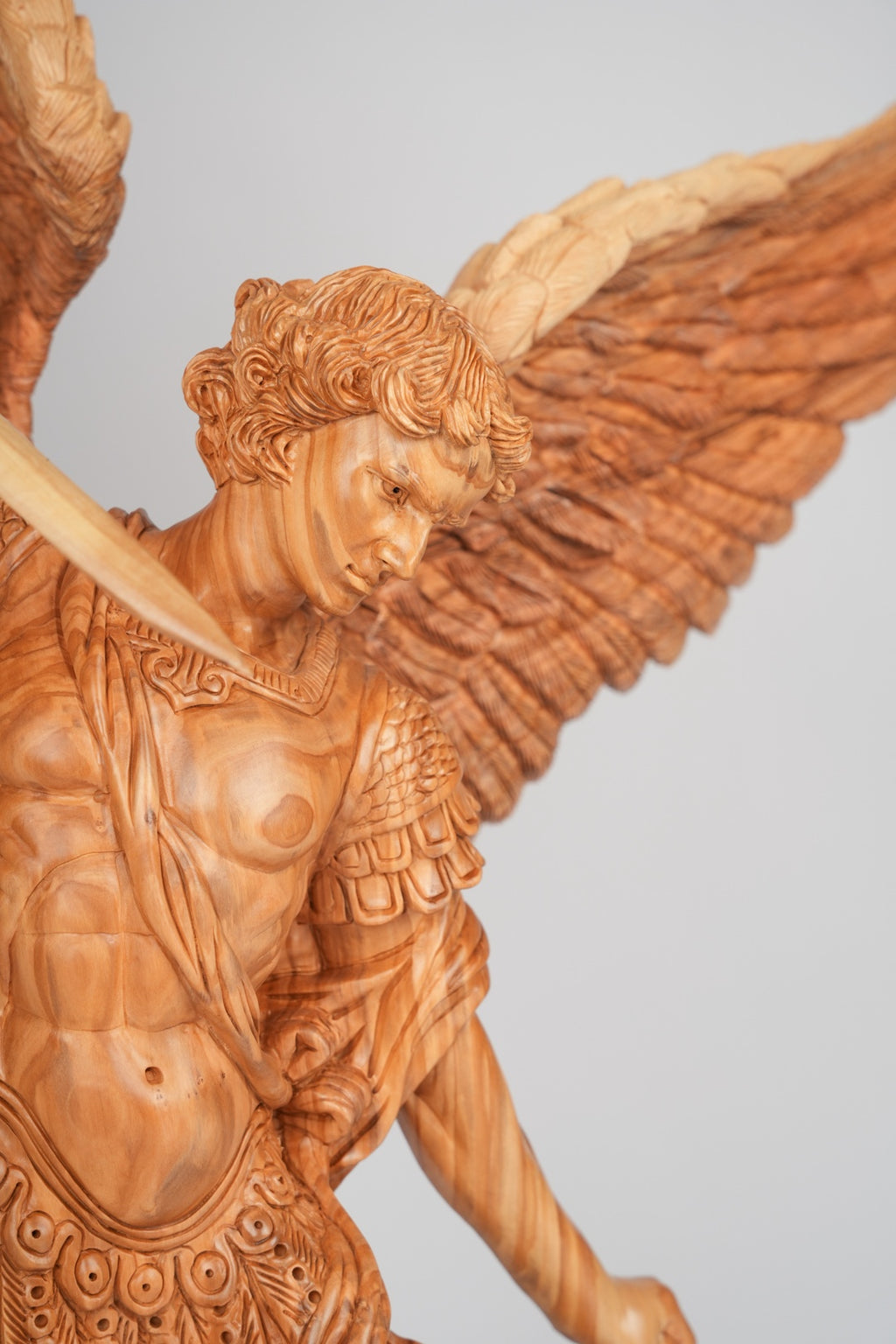 Angel olive wood statue hand carved in Bethlehem, detail of the carved figure