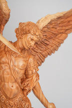 Angel olive wood statue hand carved in Bethlehem, detail of the carved figure