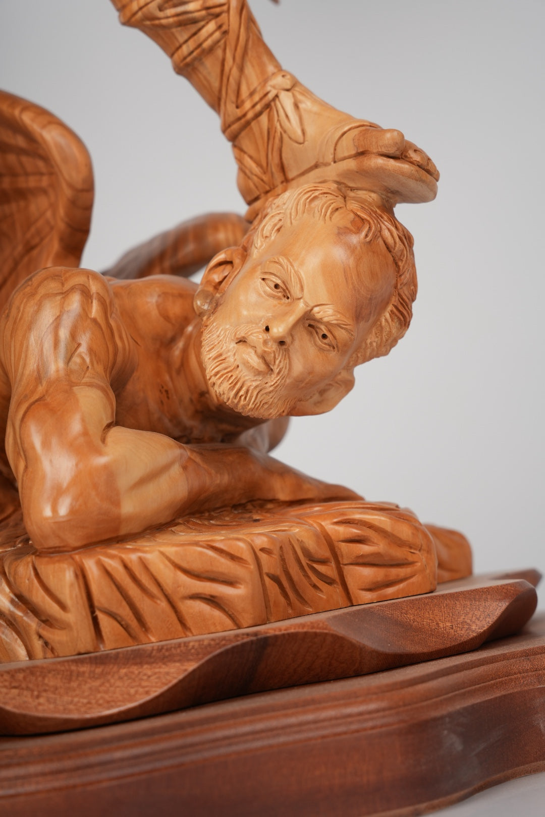 Angel olive wood statue hand carved in Bethlehem, top angle showing detail of the craftsmanship