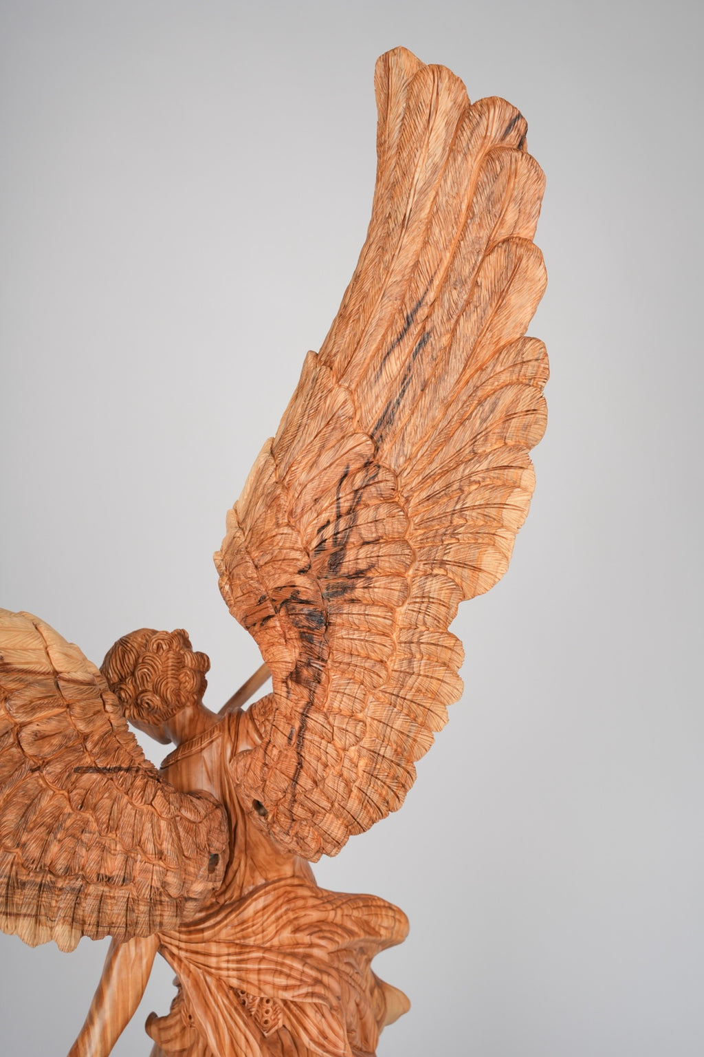 Angel olive wood statue hand carved in Bethlehem, full height view of the masterpiece