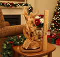 A wooden sculpture of Archangel Michael, standing on a base, with a measuring tape for scale.