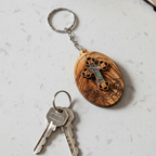 Olive wood keychain religious gift from Bethlehem, front view of the olive wood masterpiece