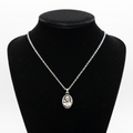 Religious jewelry hand made in Bethlehem Holy Land, front view of the olive wood masterpiece