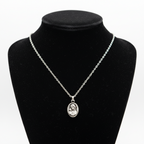 Religious jewelry hand made in Bethlehem Holy Land, front view of the olive wood masterpiece