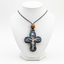 Blue-Green Mother of Pearl INRI Crucifix Necklace with a Bead on Olive Wood Base
