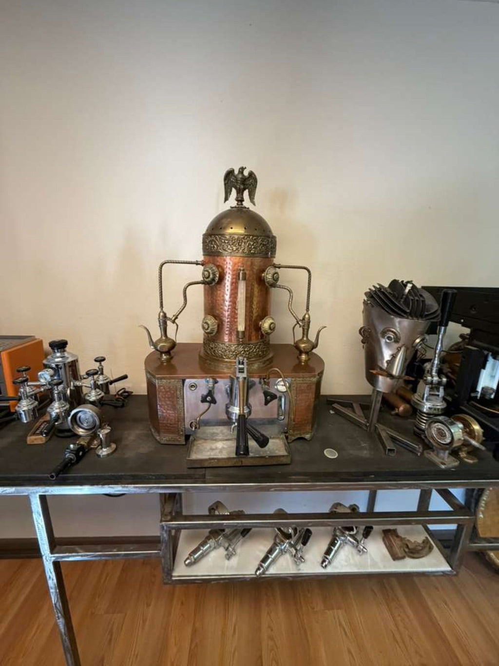 Antique copper espresso machine in the roastery