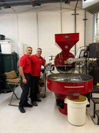 The Bannoura family beside the drum roaster in Colorado