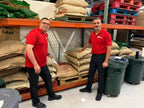 Green coffee arriving in burlap sacks at the roastery