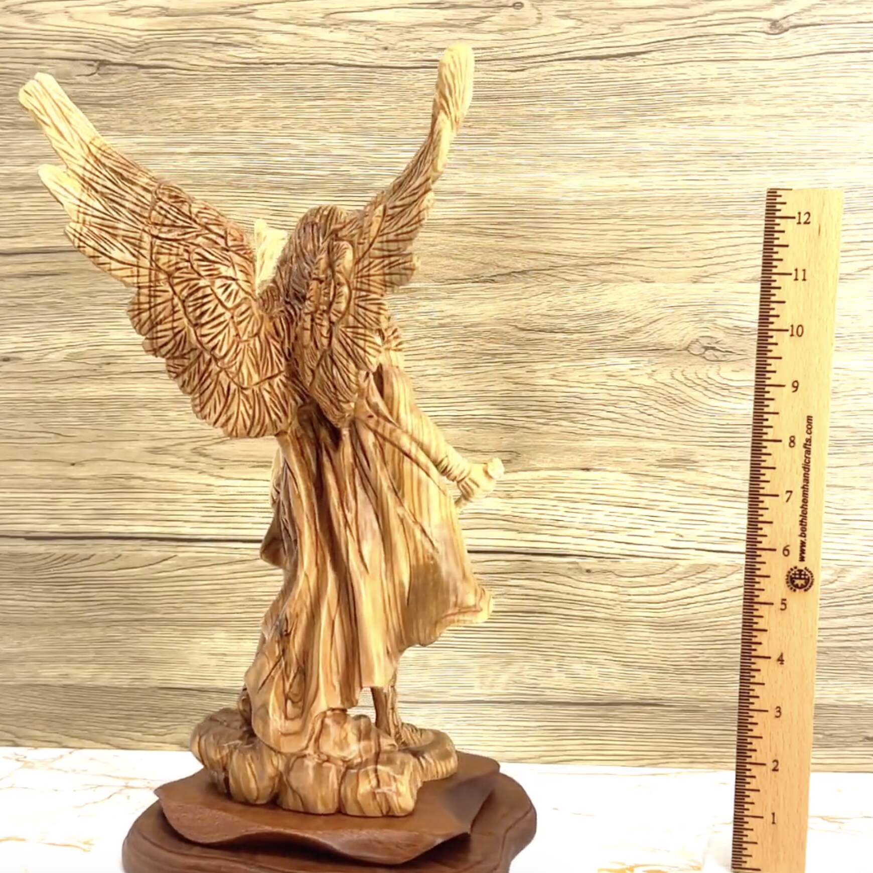 Angel olive wood statue hand carved in Bethlehem, 15 inch lifestyle photo on display