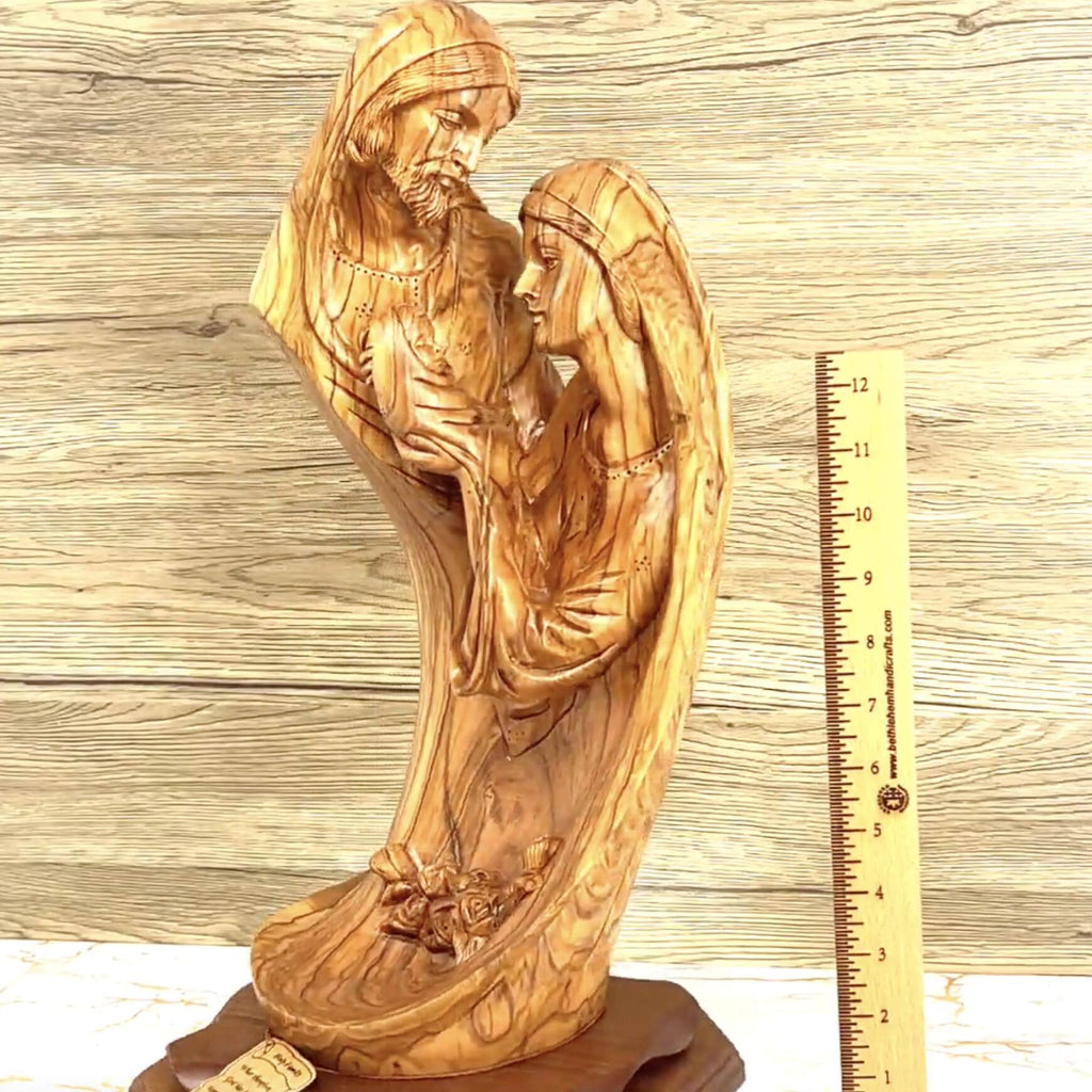 Olive wood nativity scene hand carved in Bethlehem, 18.1 inch three quarter view of the religious piece