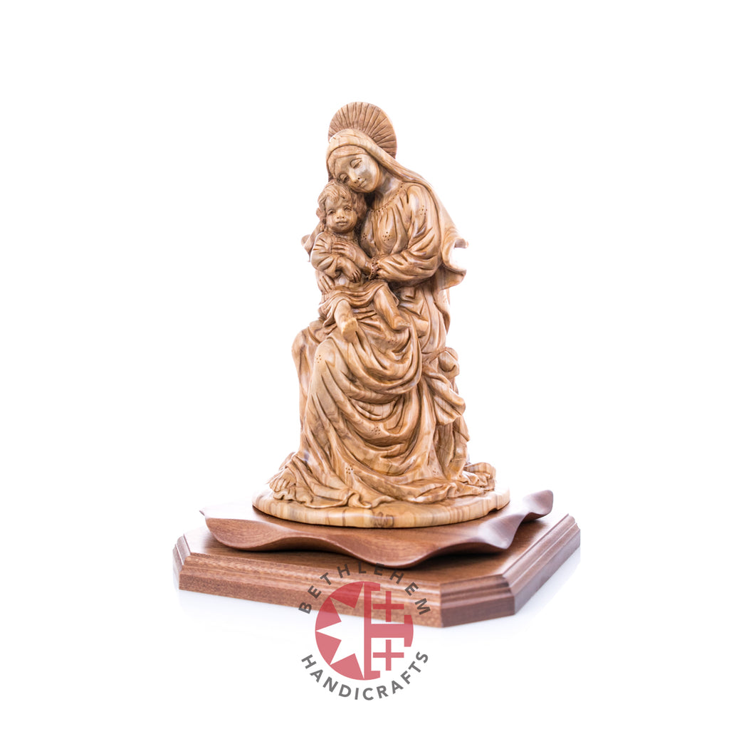 Virgin Mary olive wood statue from Bethlehem hand carved, 11 inch side angle of the olive wood sculpture