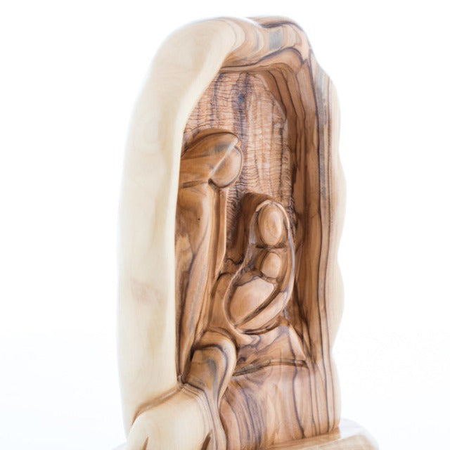 Olive wood nativity scene hand carved in Bethlehem, 7.5 inch three quarter view of the religious piece