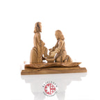 Jesus Christ statue hand carved from Bethlehem olive wood, 7.5 inch lifestyle photo on display
