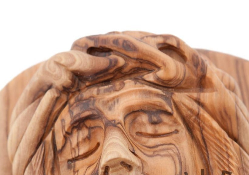 Jesus Christ statue hand carved from Bethlehem olive wood, 7.5 inch three quarter view of the religious piece