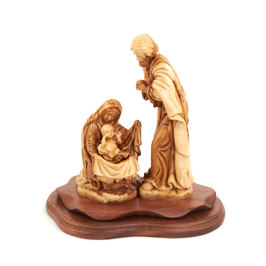 Olive wood nativity scene hand carved in Bethlehem, 11.8 inch side angle of the olive wood sculpture