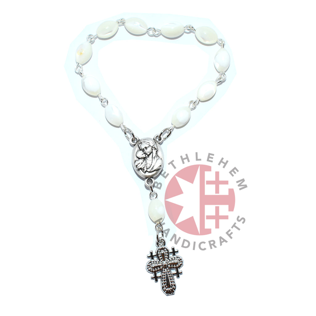 Finger rosary hand made in Bethlehem Holy Land, side angle of the olive wood sculpture