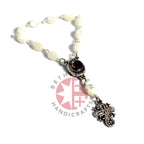 Finger rosary hand made in Bethlehem Holy Land, three quarter view of the religious piece