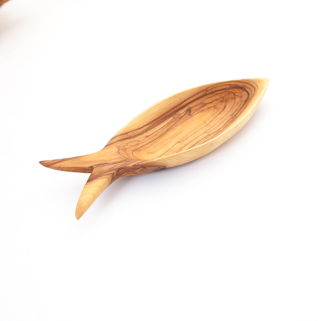 Olive wood tableware hand made in Bethlehem, side angle of the olive wood sculpture