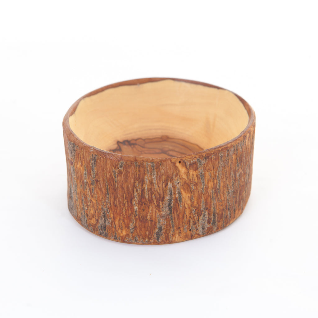 Olive wood tableware hand made in Bethlehem, side angle of the olive wood sculpture