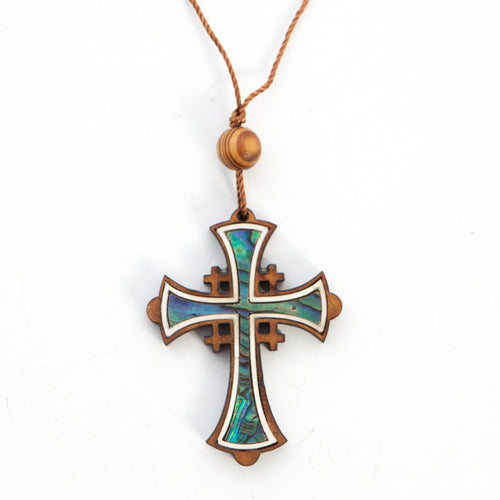 Religious jewelry hand made in Bethlehem Holy Land, side angle of the olive wood sculpture