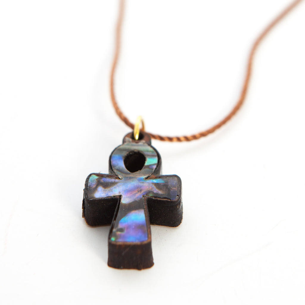 religious mother of pearl religious gift from Bethlehem, side angle of the olive wood sculpture