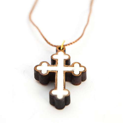 Religious jewelry hand made in Bethlehem Holy Land, side angle of the olive wood sculpture
