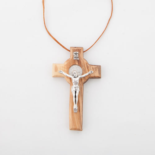 Olive wood crucifix hand carved in Bethlehem, side angle of the olive wood sculpture