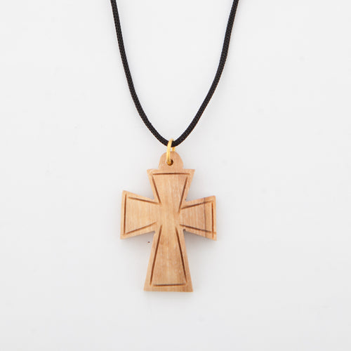 Religious jewelry hand made in Bethlehem Holy Land, side angle of the olive wood sculpture