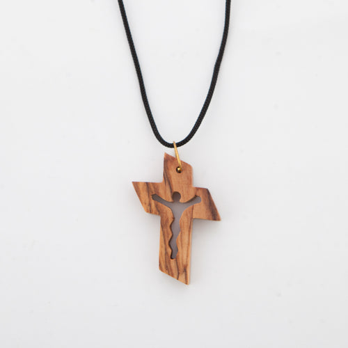 Religious jewelry hand made in Bethlehem Holy Land, side angle of the olive wood sculpture