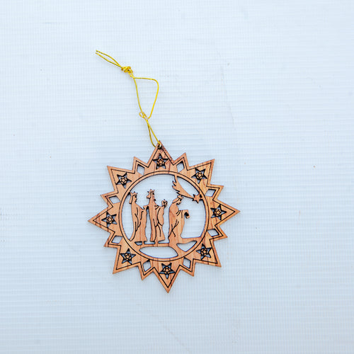 Olive wood Christmas ornament hand carved in Bethlehem, side angle of the olive wood sculpture