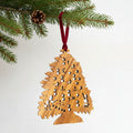 Olive wood Christmas ornament hand carved in Bethlehem, front view of the olive wood masterpiece