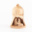 A hand-carved olive wood nativity scene bell ornament with a gold-colored ring on top for hanging.