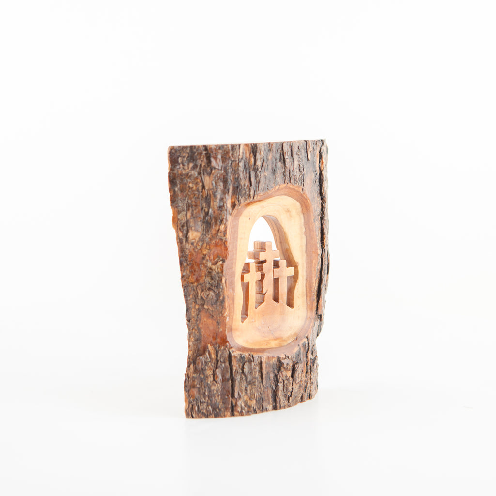 Olive wood Christmas ornament hand carved in Bethlehem, side angle of the olive wood sculpture
