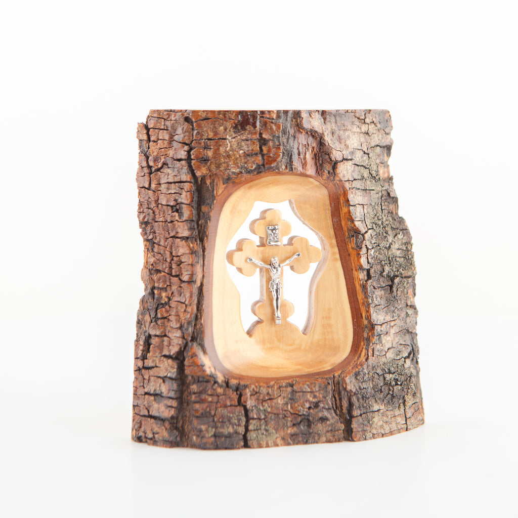 Olive wood crucifix hand carved in Bethlehem, side angle of the olive wood sculpture