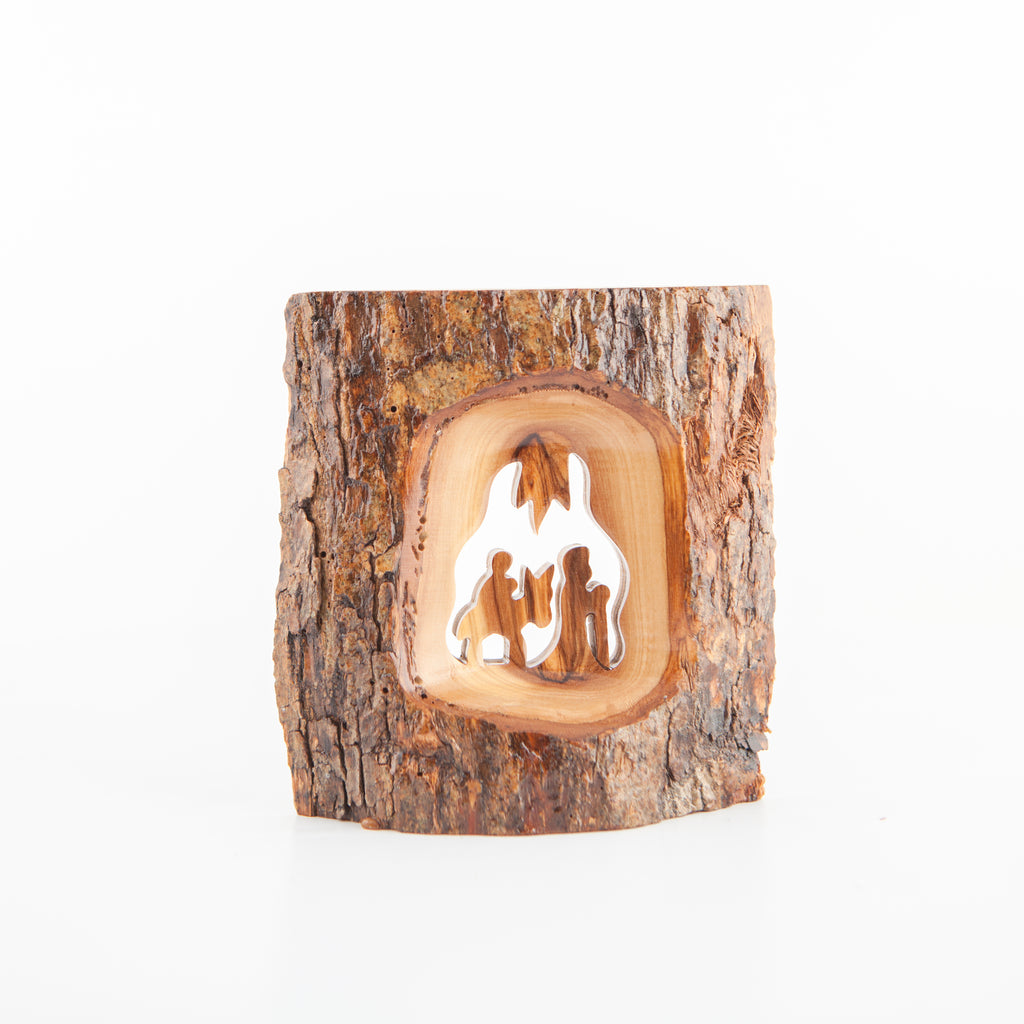 Olive wood Christmas ornament hand carved in Bethlehem, side angle of the olive wood sculpture