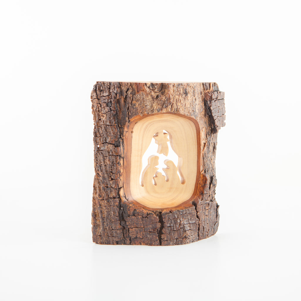 Olive wood Christmas ornament hand carved in Bethlehem, side angle of the olive wood sculpture
