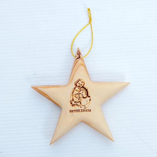 Olive wood Christmas ornament hand carved in Bethlehem, side angle of the olive wood sculpture