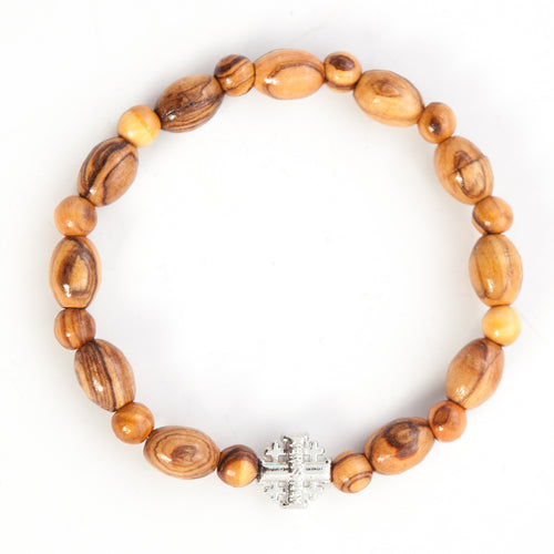 Olive wood rosary hand made in Bethlehem Holy Land, side angle of the olive wood sculpture