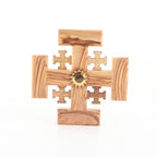 Olive wood wall cross hand carved in Bethlehem, side angle of the olive wood sculpture