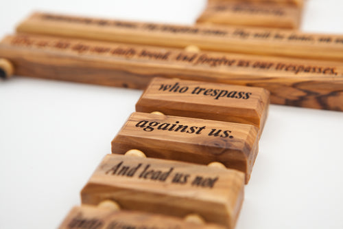 Lord's Prayer olive wood wall cross from Bethlehem, 11 inch side angle of the olive wood sculpture